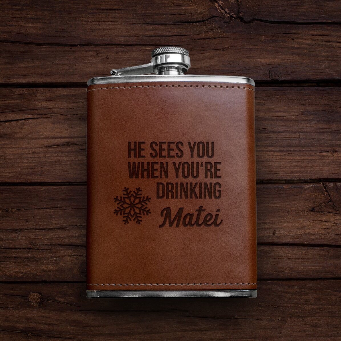 Personalised leather-covered hip flask - He sees you when you