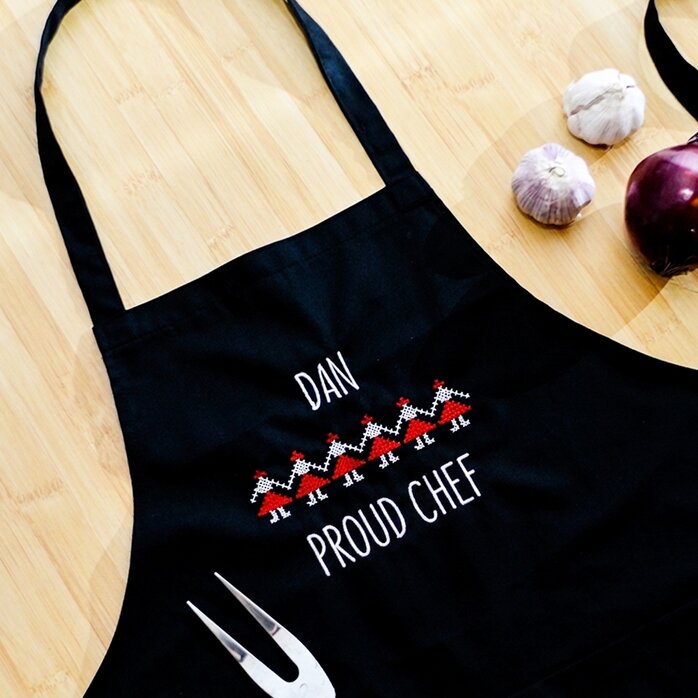 Customised apron with traditional embroidery on black